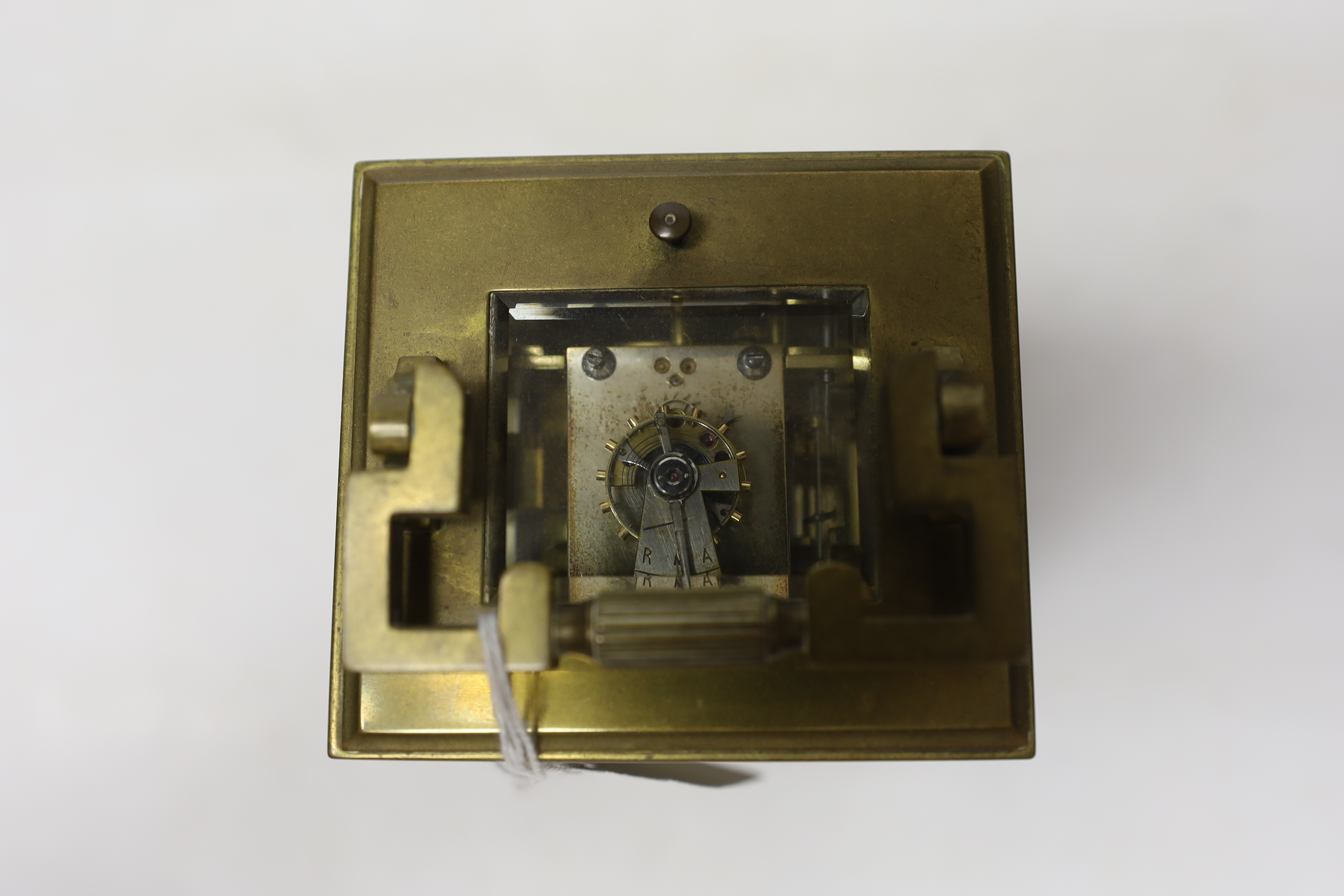 A cased early 20th century brass repeating carriage clock with alarm, 15.5cm